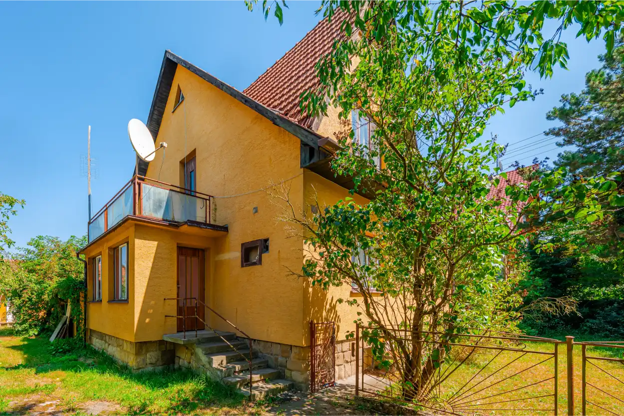 Rodinný dům s balkonem a vstupem ze zahrady